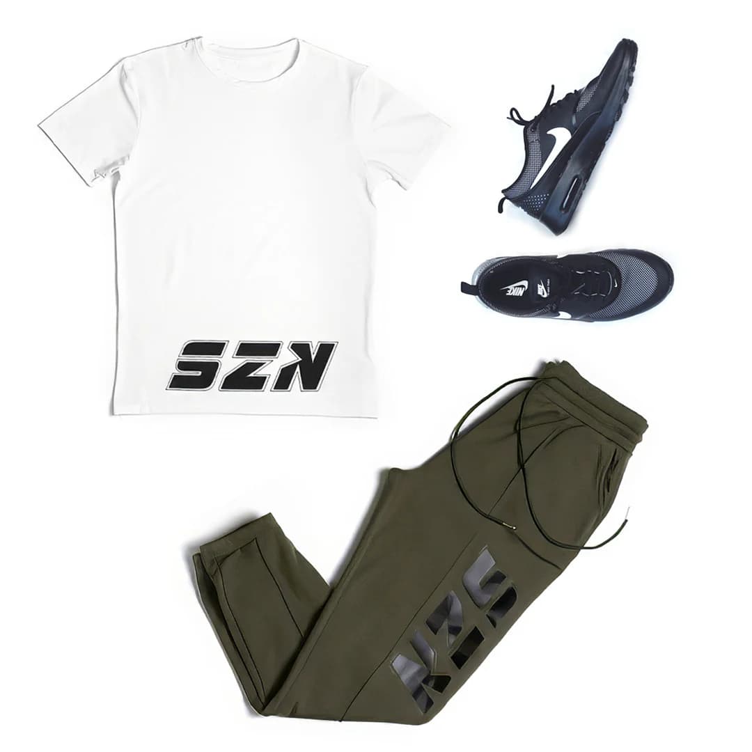 IN SZN shirt and olive joggers arranged with training shoes